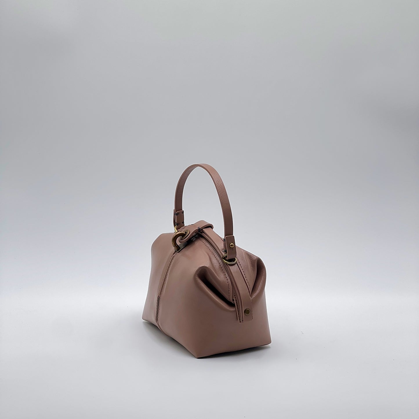 Medium glossy nude pouf