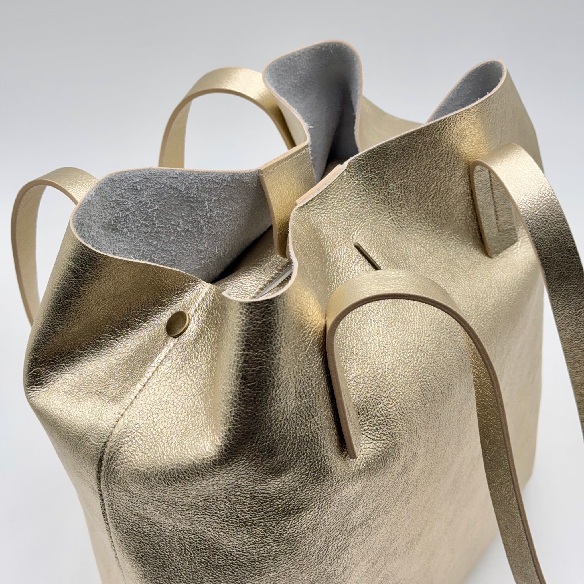 Alice bag laminato platino