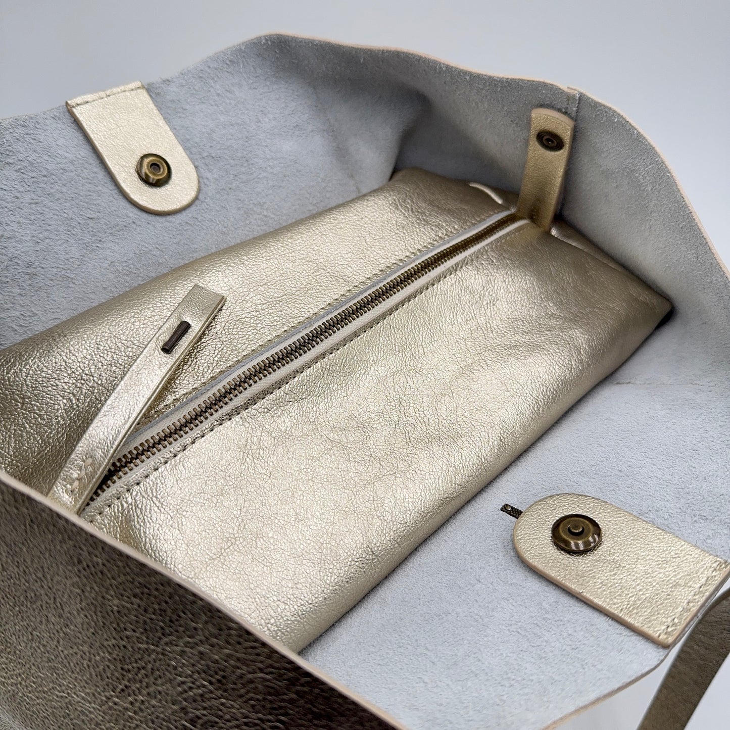 Alice bag laminato platino
