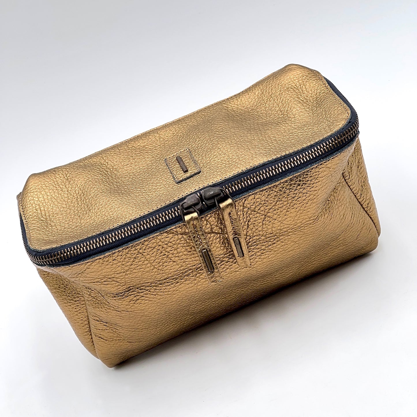 Petra martellato laminato bronzo