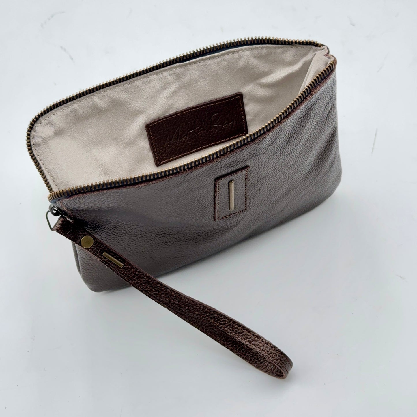 Pia Medium laminato moro