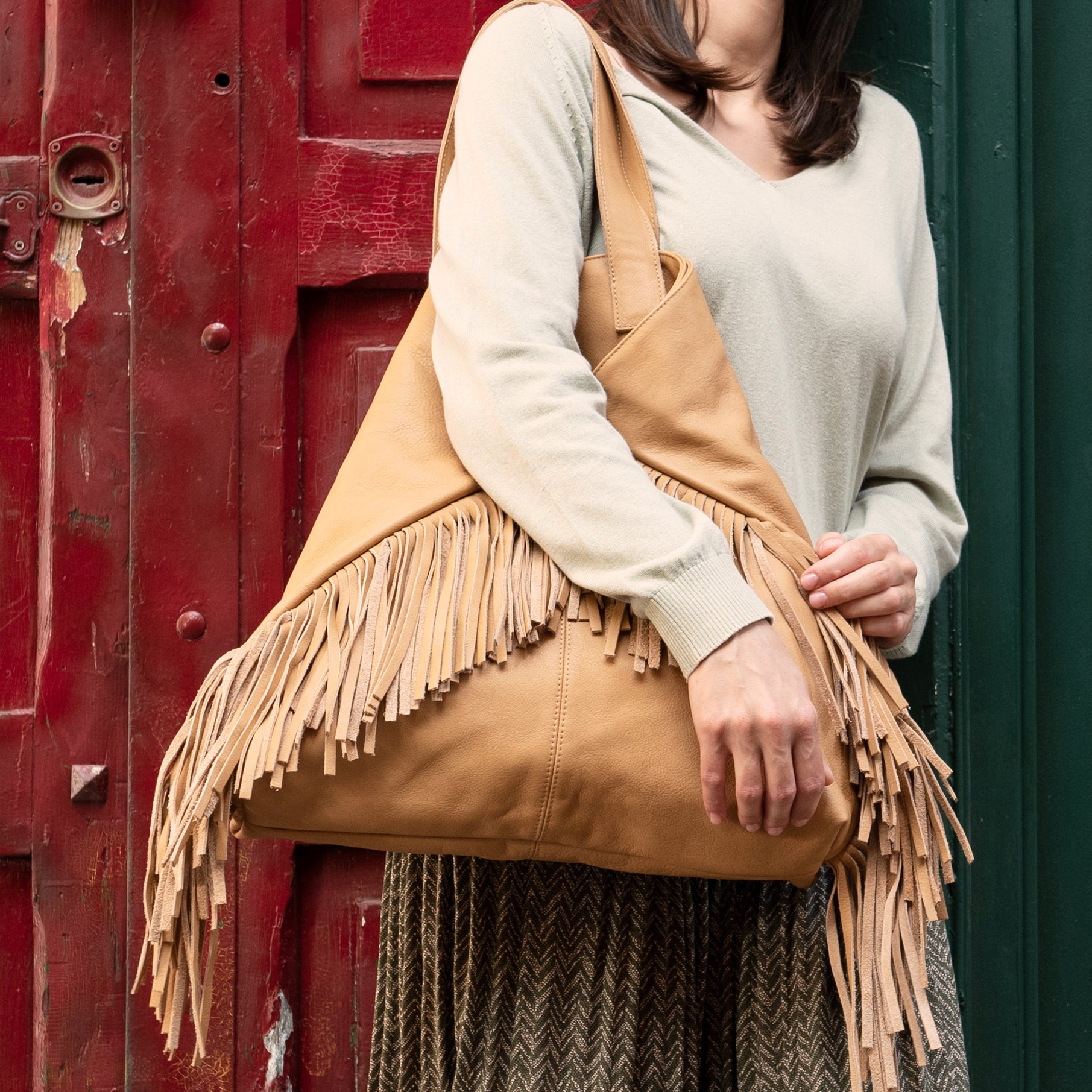 Amy mousse jeans - leather shoulder bag with blue fringes 