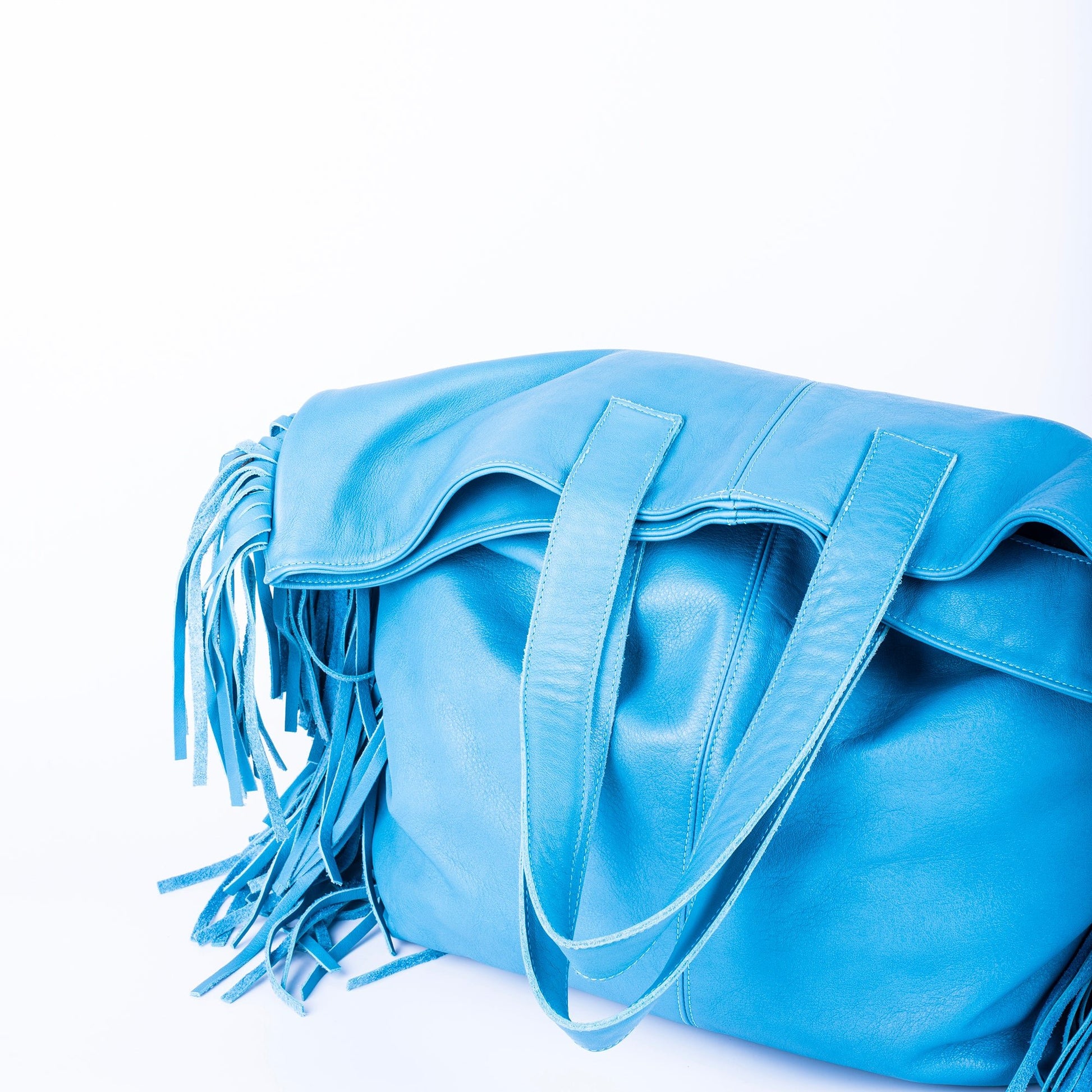 Amy mousse mare - borsa a spalla in pelle con frange celeste - Marta Ray