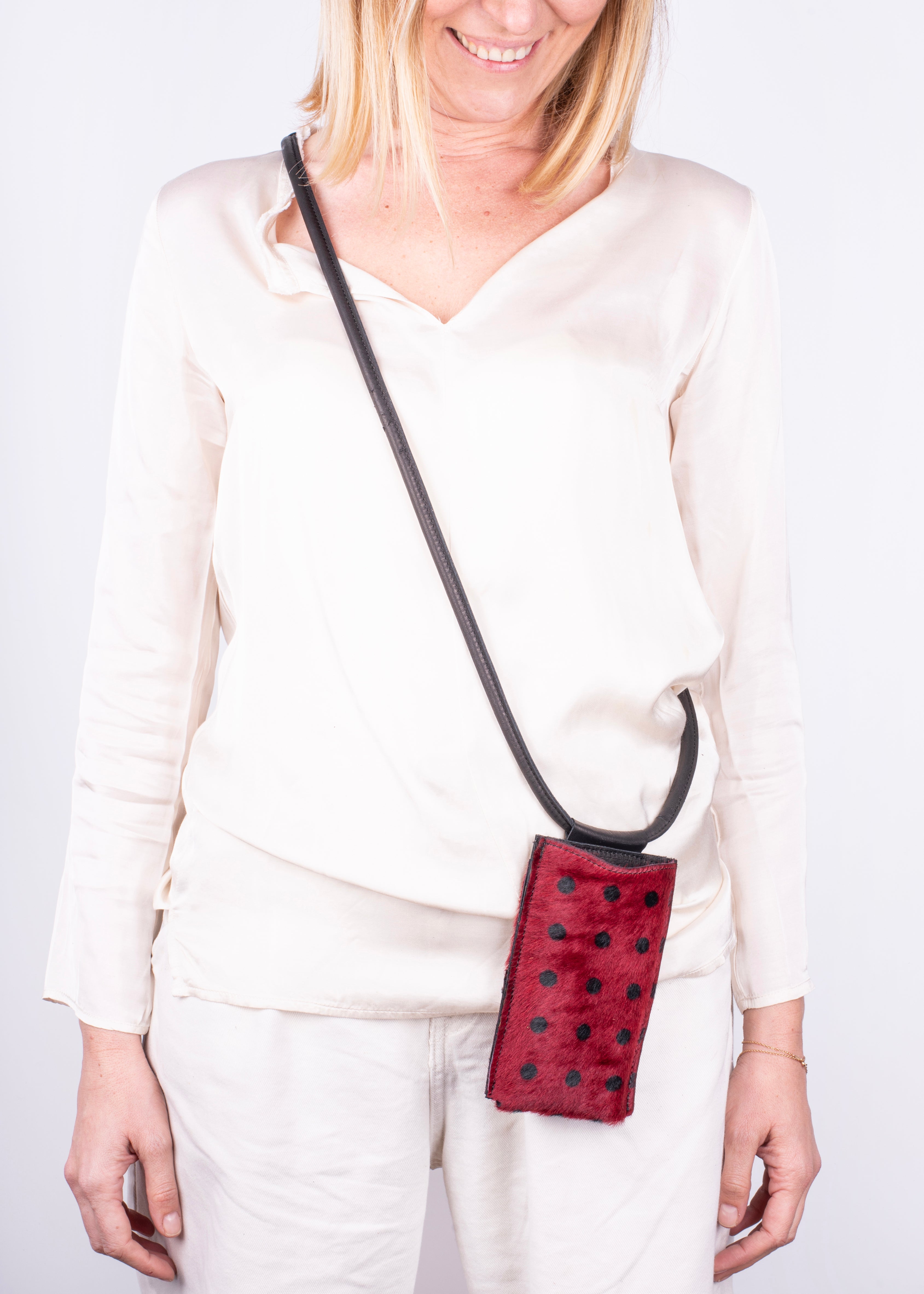 Ilde red pony with large polka dots - mobile phone holder in red pony with polka dots