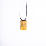 Ilde yellow pony with small polka dots - mobile phone holder in yellow pony with polka dots