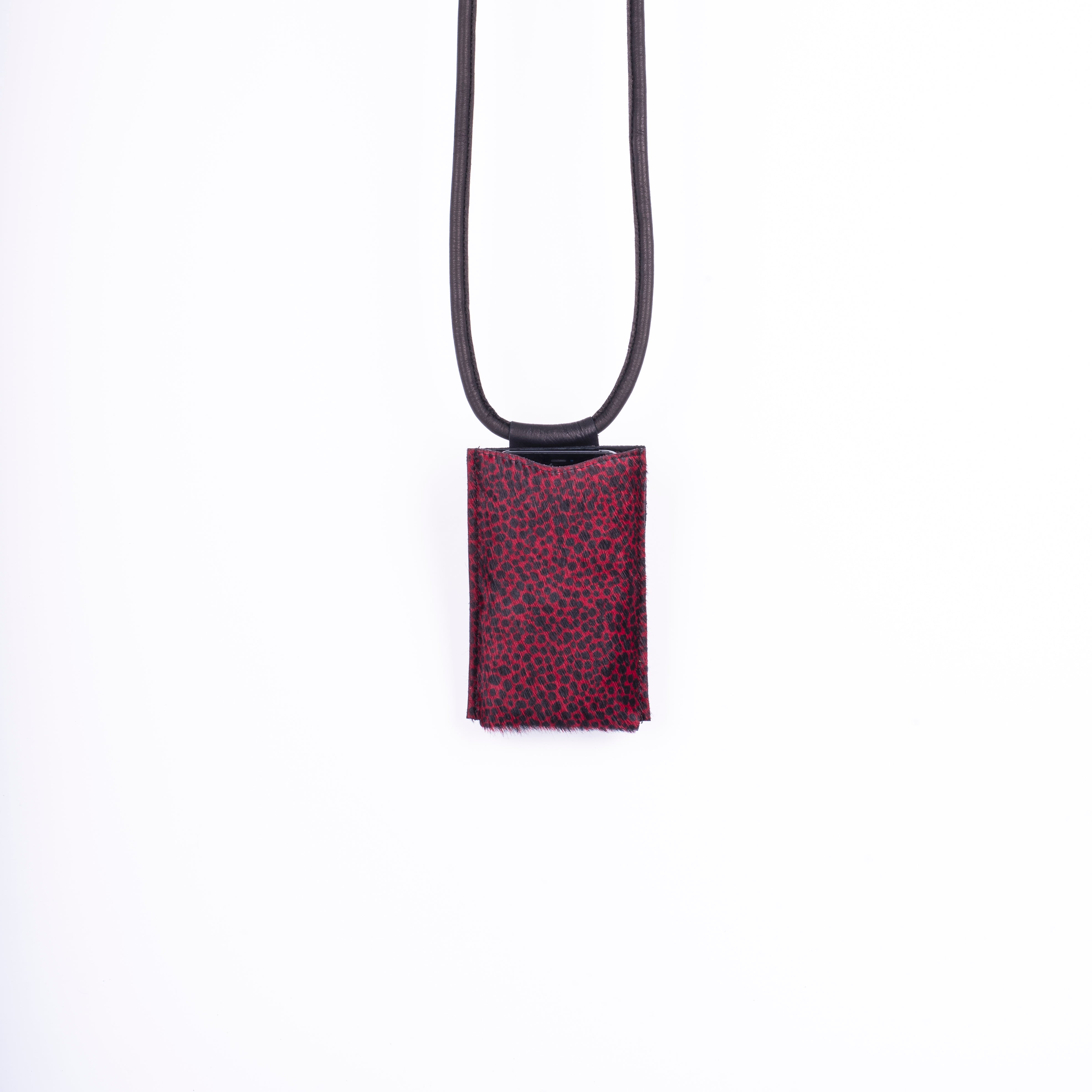 Ilde black spotted red pony - mobile phone holder in spotted red pony