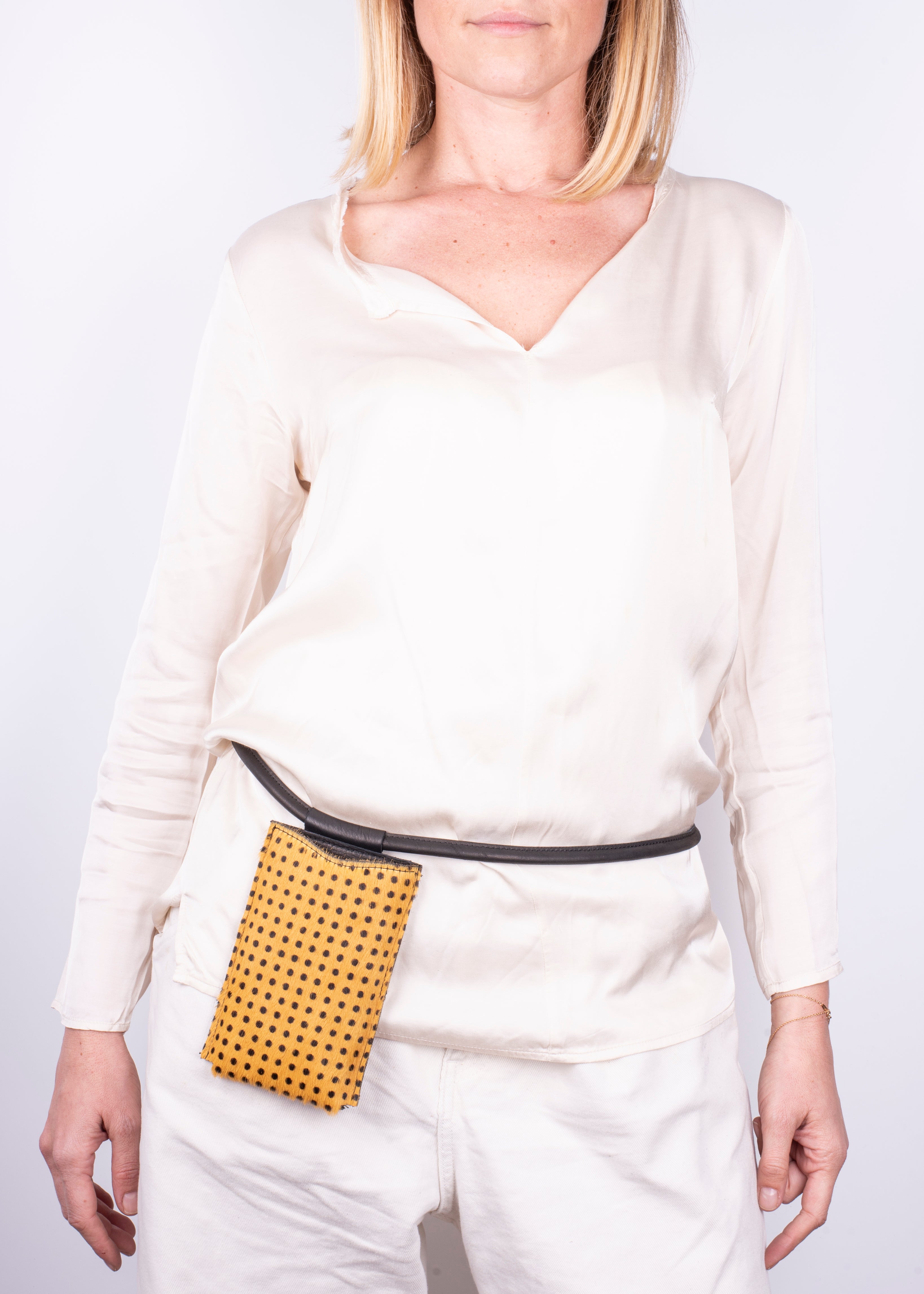 Ilde yellow pony with small polka dots - mobile phone holder in yellow pony with polka dots