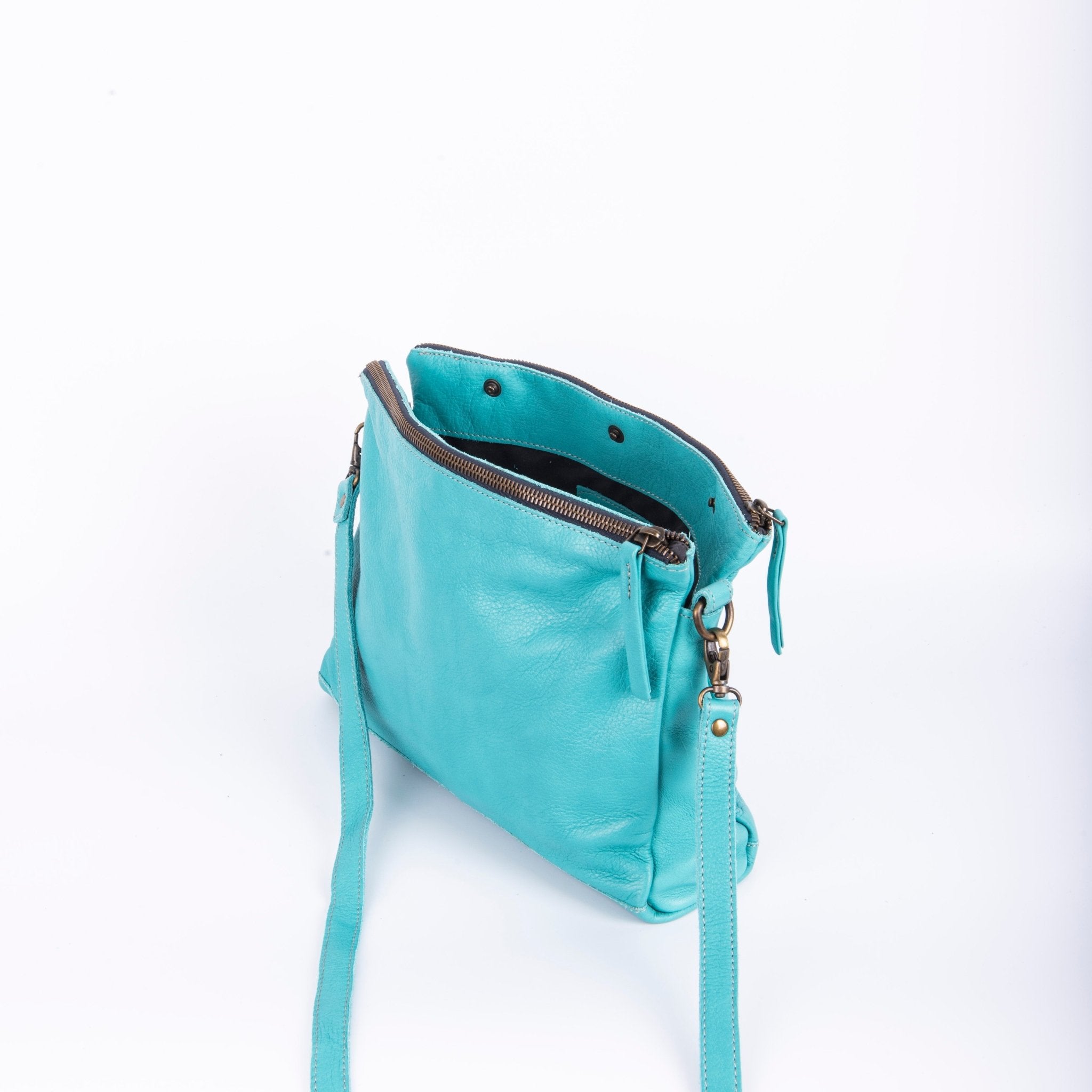 Nieves mousse turchese - piattina a tracolla piccola in pelle blu - Marta Ray