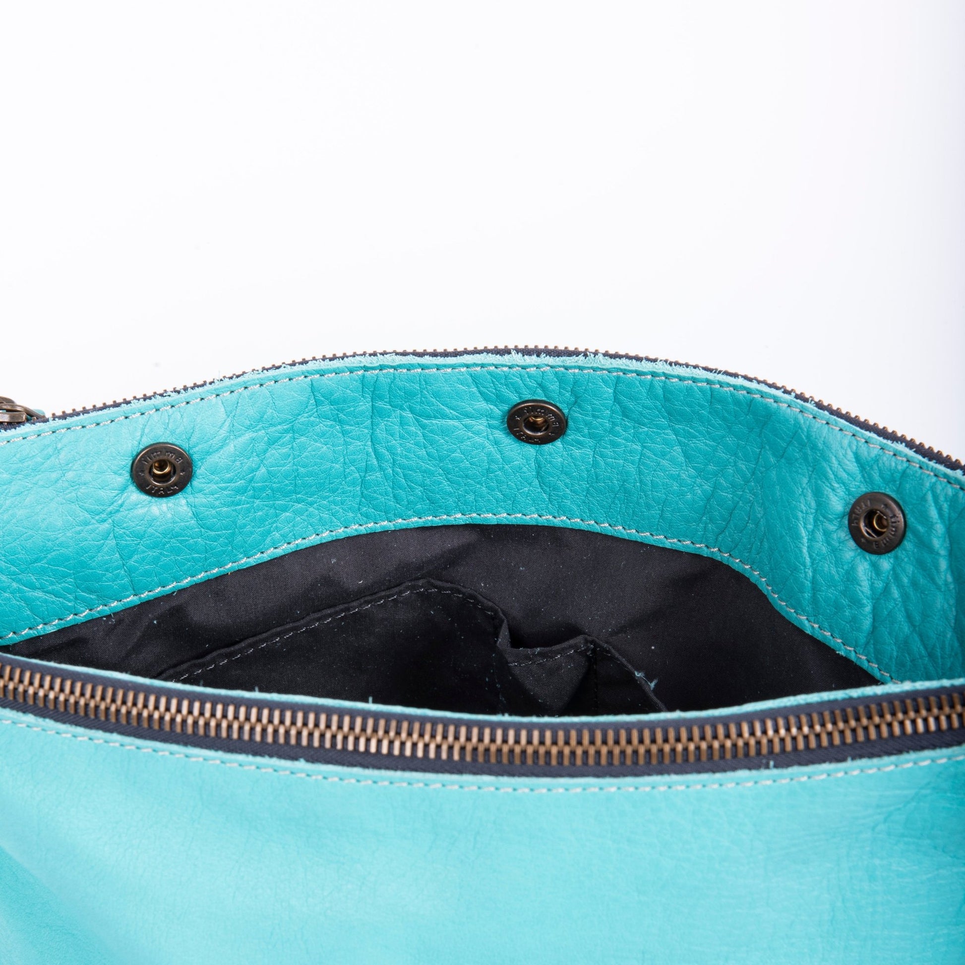 Nieves mousse turchese - piattina a tracolla piccola in pelle blu - Marta Ray